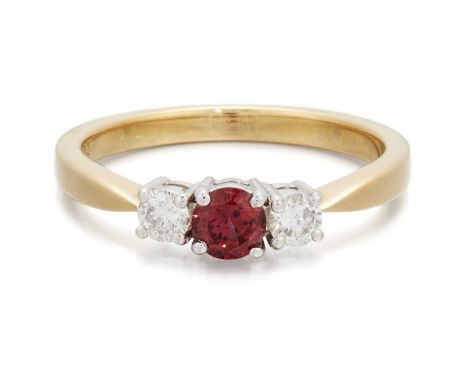 AN 18 CARAT GOLD RUBY AND DIAMOND THREE STONE RING a round-cut ruby spaced by round brilliant-cut diamonds. Estimated total d