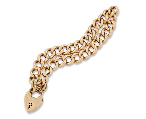 AN 18 CARAT GOLD CURB LINK BRACELET WITH A PADLOCK CLASP hallmarked Birmingham 1908, 19cm long, 17.0 gramsLight wear to links