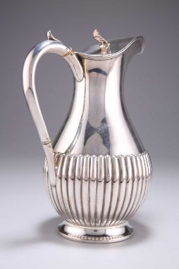 A VICTORIAN SILVER HOT WATER JUG § by Frank Fenton & Samuel Fenton, Sheffield 1887, baluster form with reeded lower half and 