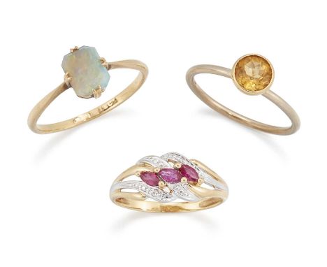 THREE RINGS comprising AN OPAL RING, marked '18CT', ring size R; A CITRINE RING, marked '750', ring size M1/2; and A RUBY AND
