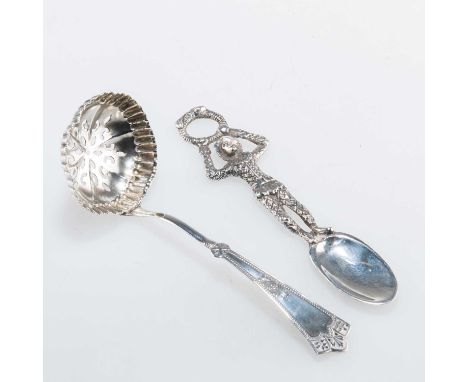 AN EDWARDIAN SILVER SPOON AND A SILVER SIFTING LADLE the figural spoon, by Charles William Fletcher, Sheffield 1901; the ladl