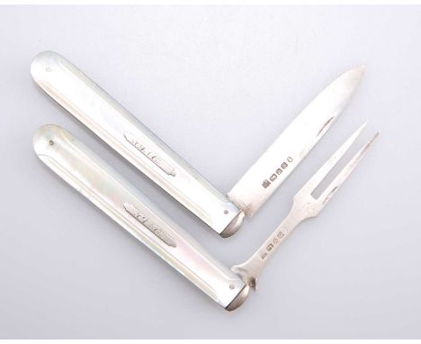 A VICTORIAN SILVER AND MOTHER-OF-PEARL CAMPAIGN KNIFE AND FORK by Martin, Hall &amp; Co, Sheffield 1855, each initialled. 8.5