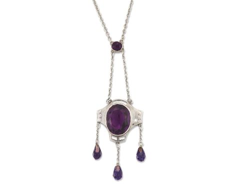 CHARLES HORNER - A SILVER AND PASTE PENDANT NECKLACE the shield-shaped pendant set with a round-cut purple paste, suspending 