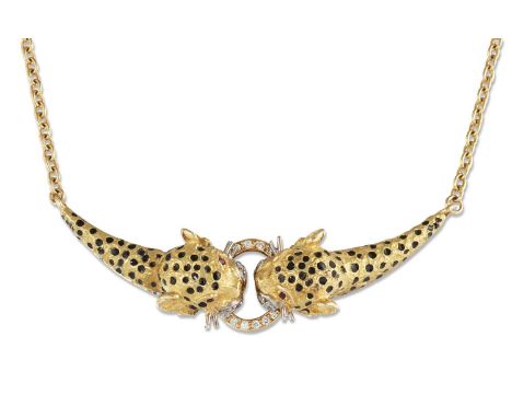 A DIAMOND AND ENAMEL NECKLACE the front formed of two leopard heads, with black enamel markings, diamond accents and ruby eye