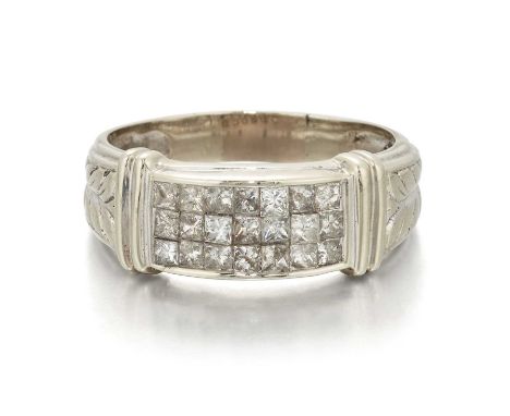 A DIAMOND RING three rows of princess-cut diamonds in a channel setting, to laurel leaf motif shoulders. Estimated total diam