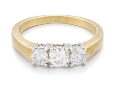 AN 18 CARAT GOLD DIAMOND THREE STONE RING graduated round brilliant-cut diamonds in claw settings. Stated total diamond weigh