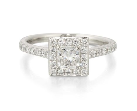 A PLATINUM PRINCESS-CUT DIAMOND CLUSTER RING a princess-cut diamond within a border of round brilliant-cut diamonds, to diamo