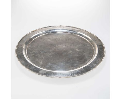 A CHINESE EXPORT SILVER TRAY mark of Zee Wo, Shanghai, late 19th/early 20th Century, circular, with spot-hammered ground and 