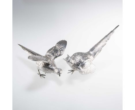 A PAIR OF ELIZABETH II SILVER TABLE MODELS OF PHEASANTS by Mappin &amp; Webb Ltd, London 1976, the first cast with wings out-