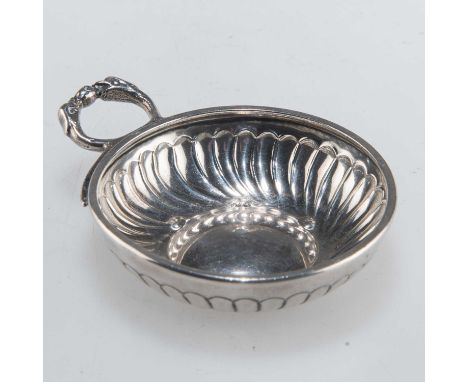 A 19TH CENTURY FRENCH SILVER TASTE-VIN maker's mark MP with an arrow between, circular with conjoined serpent handle. 9.3cm w