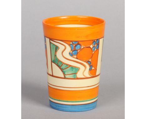 A Newport pottery beaker by Clarice Cliff. Decorated in overglaze enamels with the Sunrise pattern from the Fantasque range. 