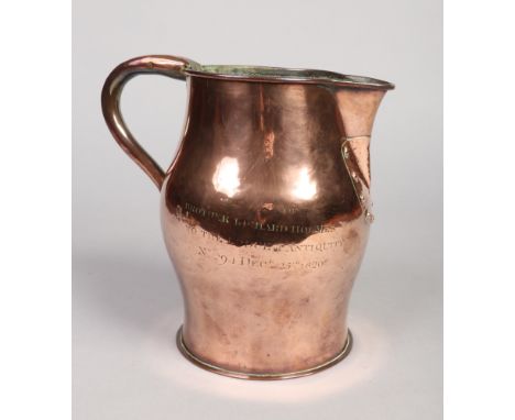 A George IV Masonic copper baluster ale jug with plain loop handle. Engraved with a square and compass and inscribed (indisti