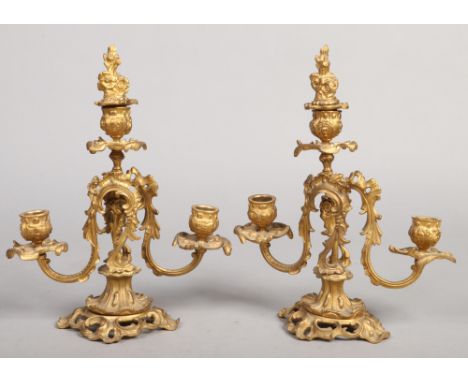 A pair of French Neo-Rococo ormolu three branch candelabra c.1900, 31cm. Good condition. No breaks. Assemblies loose.