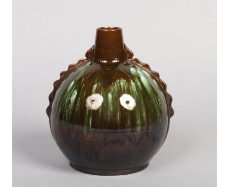 A Linthorpe pottery Aztec style bottle vase designed by Dr. Christopher Dresser. With reeded mouldings to the shoulders, inci