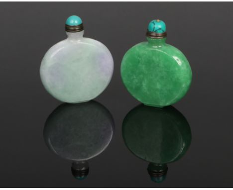 Two Chinese carved jade snuff bottles of moon flask form. Each with domed turquoise coloured stoppers with white metal mounts