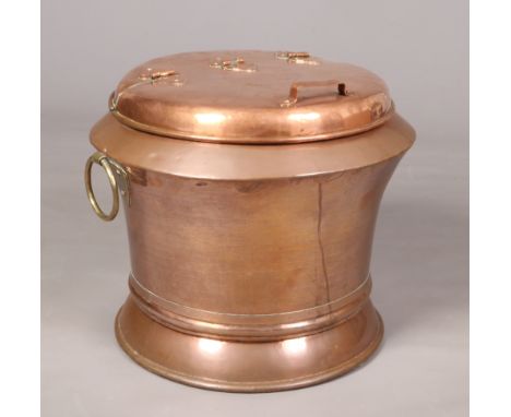 A 19th century Country House copper ice caddy. With hinged cover and brass looped carrying handles, 55cm high. 