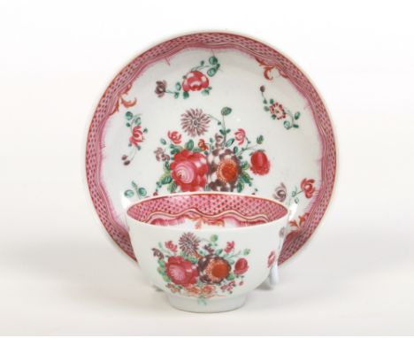 A rare Baddeley Littler teabowl and saucer. Painted in Chinese export style with flowers under pink scales borders c.1780-85,