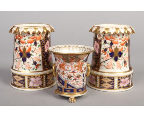 A pair of Royal Crown Derby Imari candle stands, printed marks c.1835 along with a similar Spode spill vase with loop handles