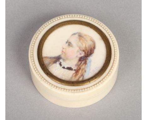 An early 20th century carved ivory pill box and cover. Decorated with a portrait miniature of a girl. Monogrammed J. H. M. 6c