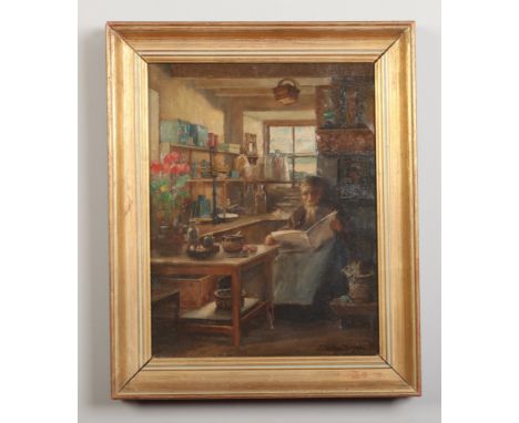 J. Morton Dunlop gilt framed oil on canvas. Genre interior scene with a shopkeeper reading. Signed, 44cm x 34cm. One small te