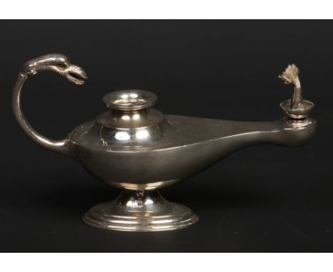 A George V silver cigar lighter in the form of an oil lamp by Asprey &amp; Co. Ltd.  Assayed Birmingham 1926, 75 grams, 15cm.