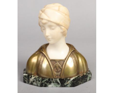 Jacques Marin (Belgian 1877-1950) bronze and marble shoulder length bust of a maiden. Wearing a turban and cloak. Raised on a