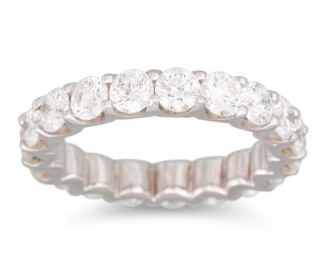 A DIAMOND FULL BAND ETERNITY RING, the brilliant cut diamonds mounted in 18ct white gold. Estimated: weight of diamonds: 3.75