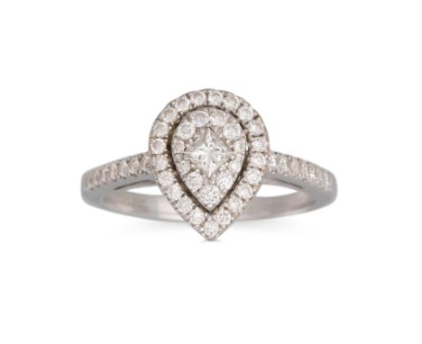 A DIAMOND CLUSTER RING, the pear shaped cluster mounted on a diamond set band in 18ct white gold, size K - L