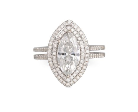 A DIAMOND CLUSTER RING, the marquise diamond to a double row diamond surround, split diamond set shank, mounted in white gold