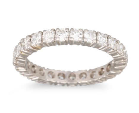 A DIAMOND ETERNITY RING, set with brilliant cut diamonds. Estimated: weight of diamonds: 1.50 ct. colour and clarity: G/H, VS