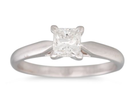 A DIAMOND SOLITAIRE RING, by Michael Hill, the princess cut diamond mounted in 14ct white gold. Estimated: weight of diamond: