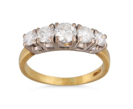 A DIAMOND FIVE STONE RING, the graduated round brilliant cut diamonds mounted in 18ct yellow gold. Estimated: weight of diamo