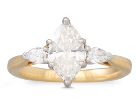 A DIAMOND SOLITAIRE RING, the marquise cut diamond to diamond shoulders, mounted in yellow gold, together with a GIA Cert sta