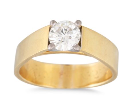 A DIAMOND SOLITAIRE RING, the round brilliant cut diamond to a high broad set 18ct yellow gold ring mount. Estimated: weight 