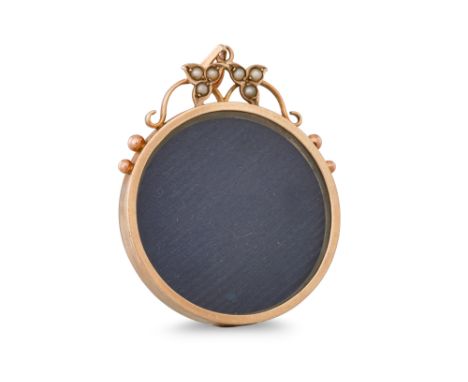 AN ANTIQUE GOLD DOUBLE SIDED LOCKET, seed pearl set