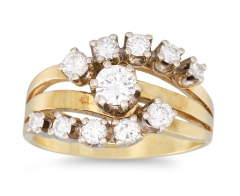 A DIAMOND CLUSTER RING, the split shank mounted in 14ct yellow gold. Estimated: weight of diamonds: 0.90 ct. colour and clari