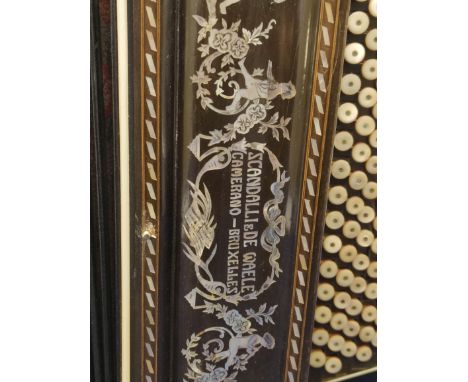 Antique Chromatic accordion by Scandalli de Waele, Camercanco -Bruxelles, lacquered wooden body with mother of pearl inlay. 
