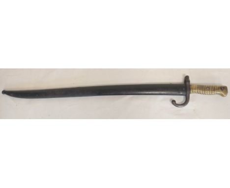 French M1866 Chassepot sword bayonet dated February 1869, with brass ridged handle, inspection marks to ricasso and numbered 