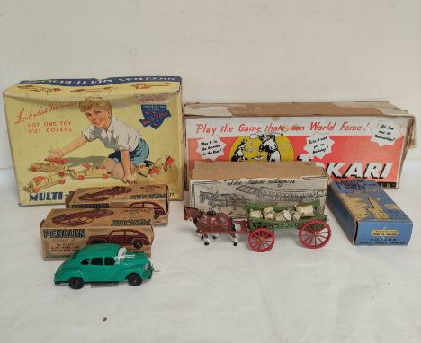 Collection of 1940s/1950s childrens toys to include a boxed Charbens farm wagon and horse in play worn condition, two Penguin