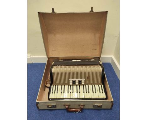 Vintage Hohner iii M, 41 key accordion, in hard carry case. 
