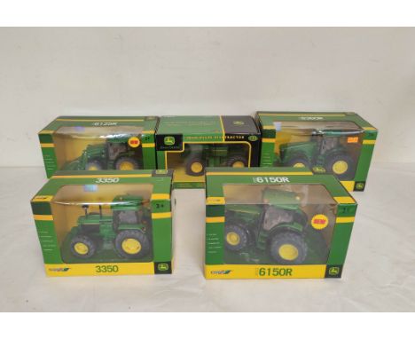 Five boxed Britains John Deere model tractors to include a 1:32 scale 8440 tractor 42471, a 1:32 scale 2011 8360R tractor 426