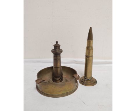 WW1/2 trench art lighter constructed from a .50 caliber casing and a brass ashtray with a lighthouse finial. (2) 