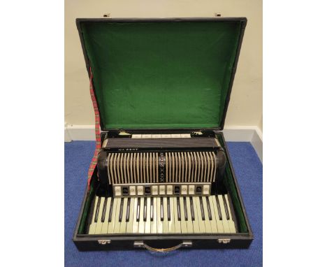 Vintage Hohner VM accordion in hard carry case, with faux ivory keys. 