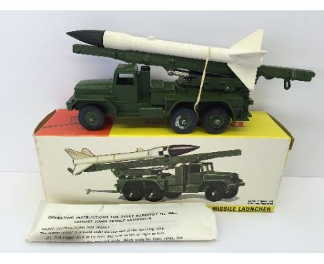 Dinky Toys 665 Honest John Missile Launcher. E in VG/E box (price in pen to one end and side) with instruction leaflet.