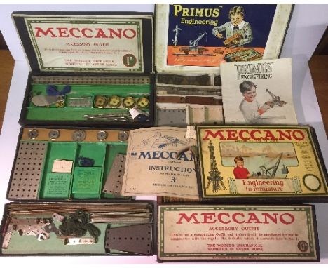 Meccano, nickel and brass: Outfit 0, with instruction booklet; Accessory Outfit 0A; Accessory Outfit 1A, with leaflet 'Owing 