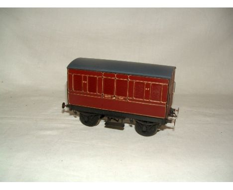 An 0 Gauge PC Models Brass Kit Built MR Maroon Meat Van. Expertly built with 3 link couplings, sprung Buffers and scale Wheel