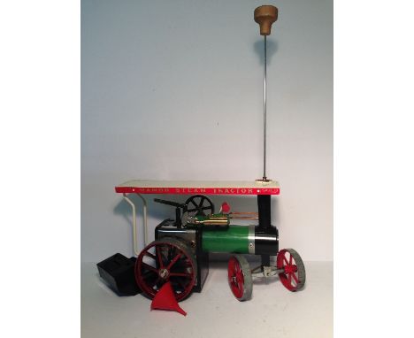 Mamod TE1a Steam Tractor, includes steering rod, scuttle and funnel. Has been fired but otherwise VG, unboxed. 