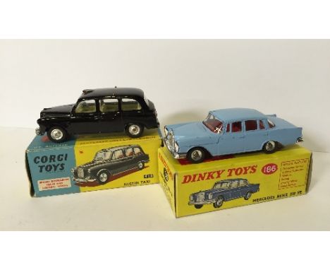 Corgi Toys 418 Austin Taxi, black with lemon interior, VG in VG box. Together with a DINKY Toys 186 Mercedes Benz 220 SE, lig