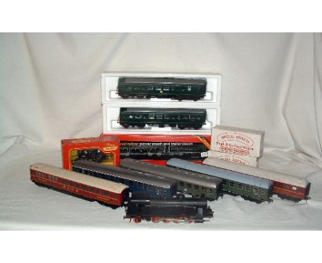 A Box containing 00 and HO Model Railway - 00 - HORNBY R157 2 Car Met Cam DMU Power and Dummy Car (missing couplings otherwis