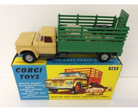 Corgi Toys 484 Dodge 'Kew Fargo' Livestock Transporter with Animals, tan cab with dark silver chassis, green back, card 'hay'